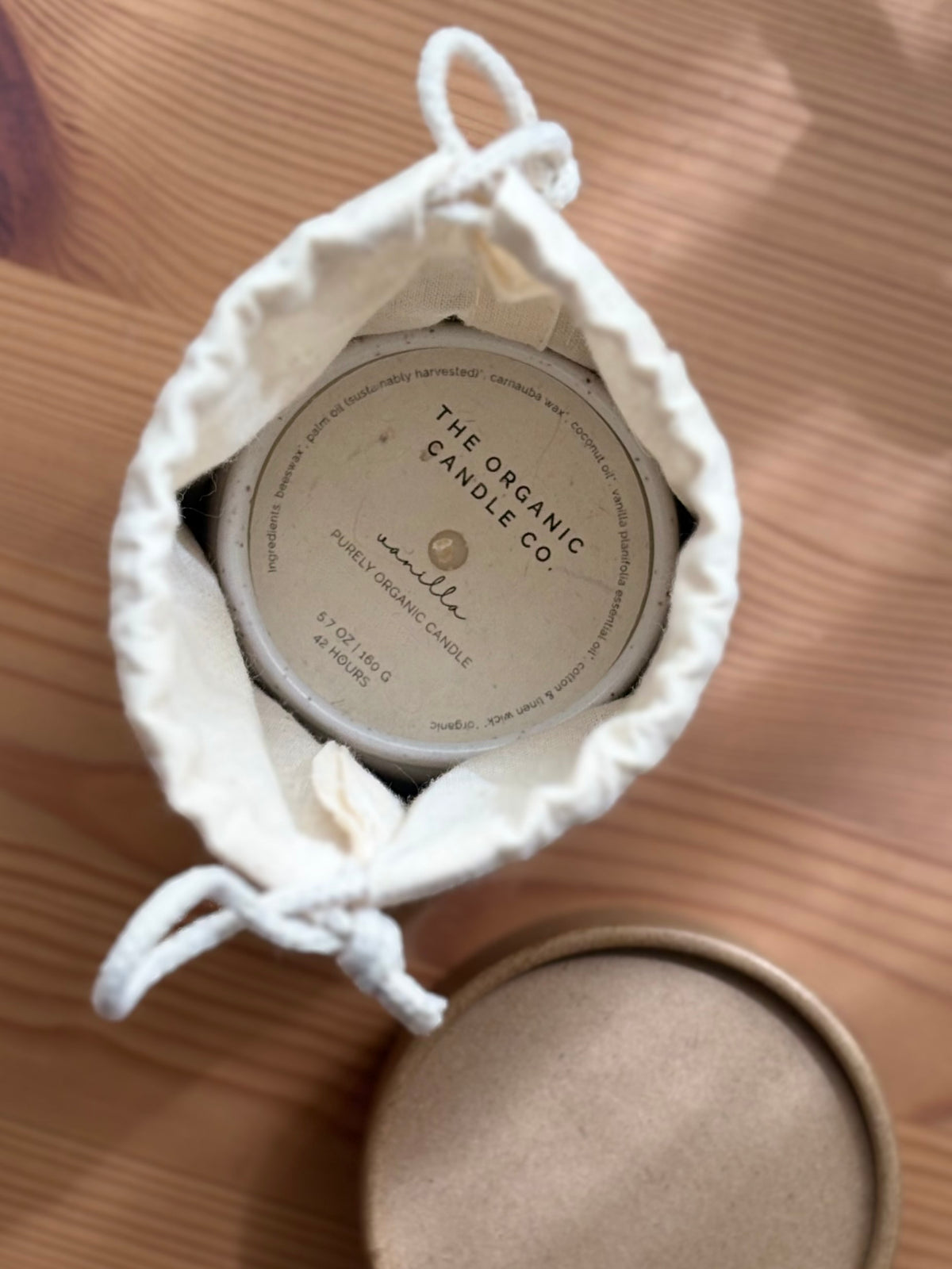 Candle in a decorative bag with &