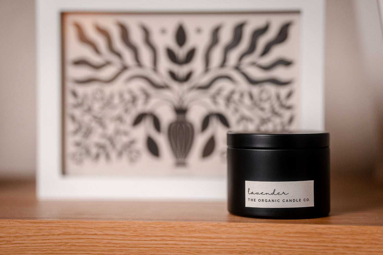 Black candle labeled &